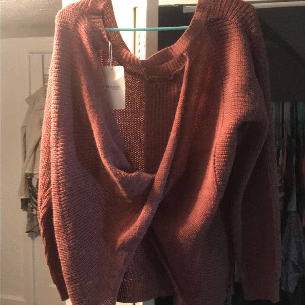 Open back boutique sweater